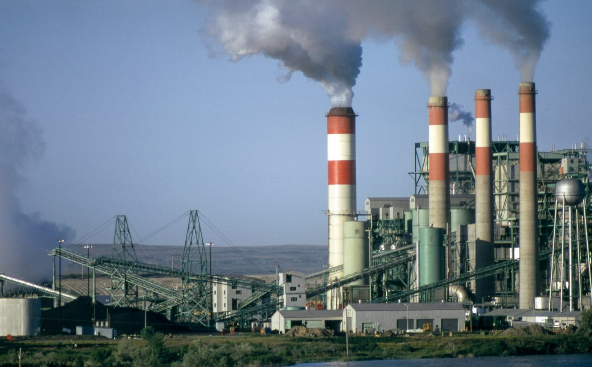 Industrial power plant illuminated at night