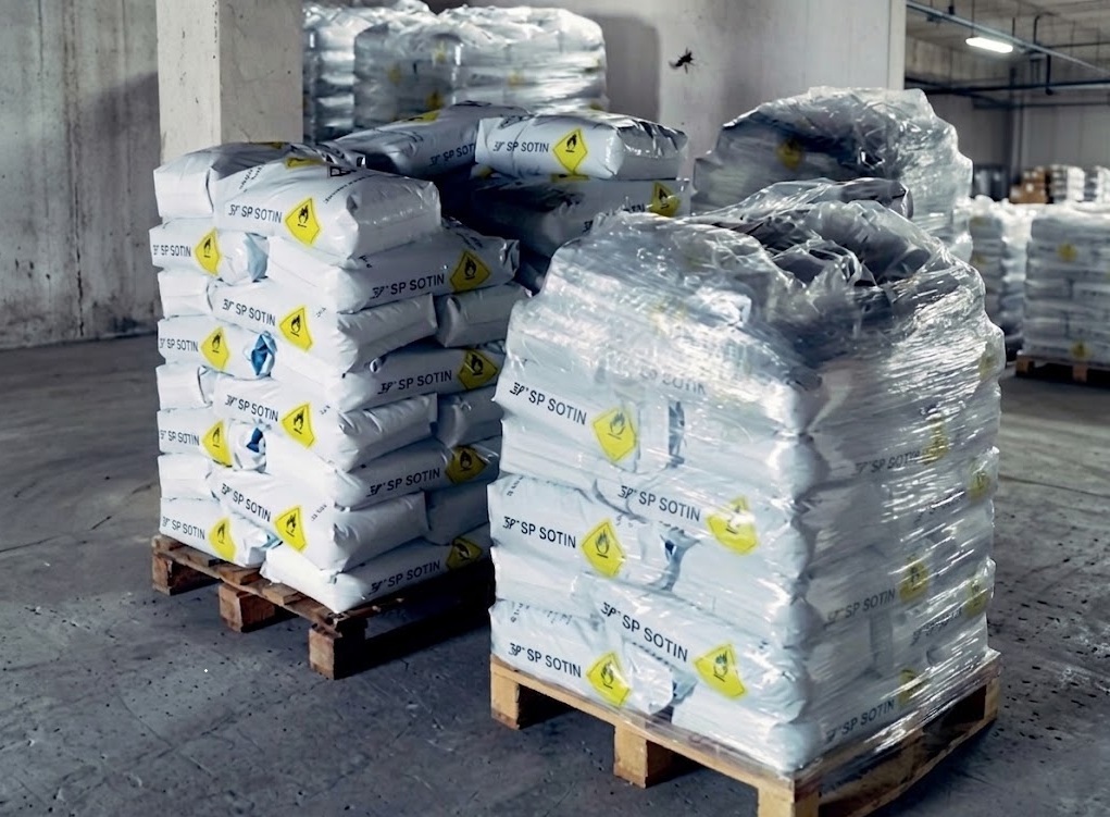 Shrink-wrapped SP SOTIN pallets in dry warehouse storage